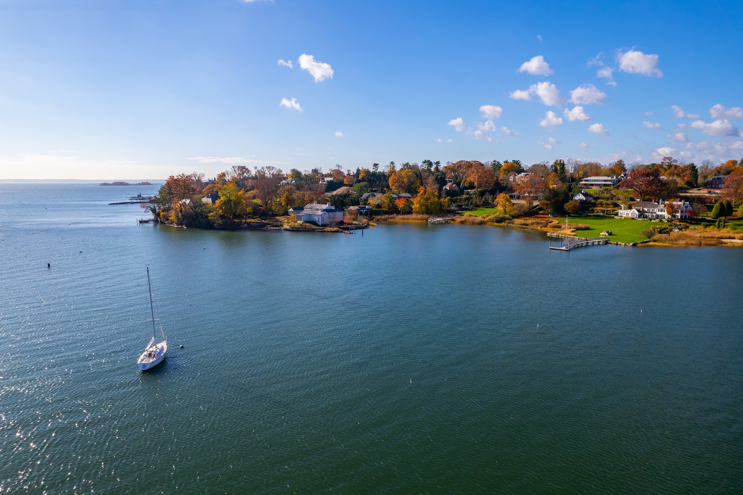 Connecticut Harbor landscape with a sailboat